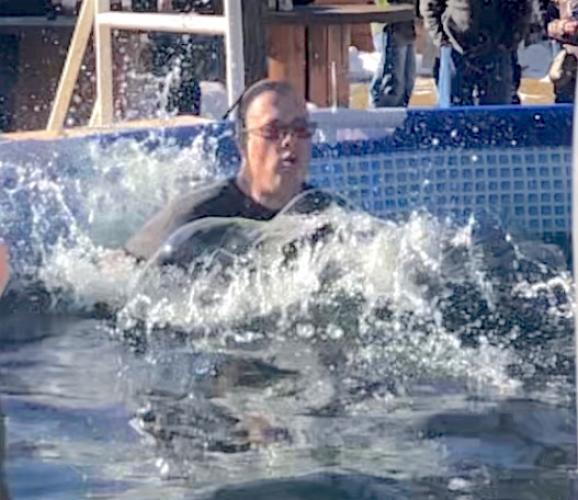 Sam Bradbury makes a splash in his 10th polar plunge.