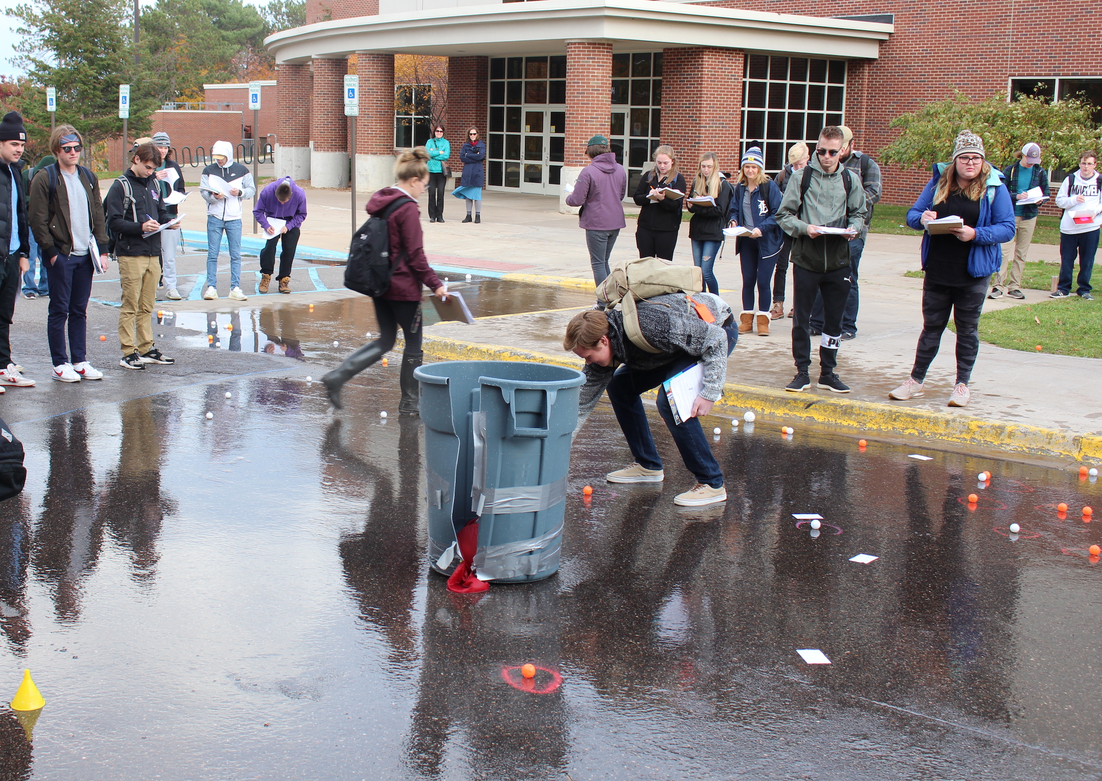 The trash can developed a crack after the first eruption, but split wide open after more liquid nitrogen was added for the second.