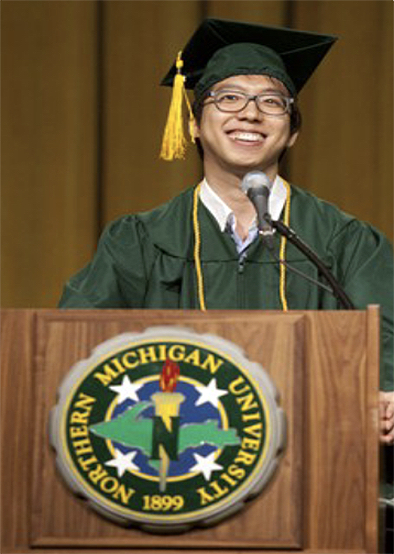 YoungJong Lee speaking at NMU's December 2012 commencement.
