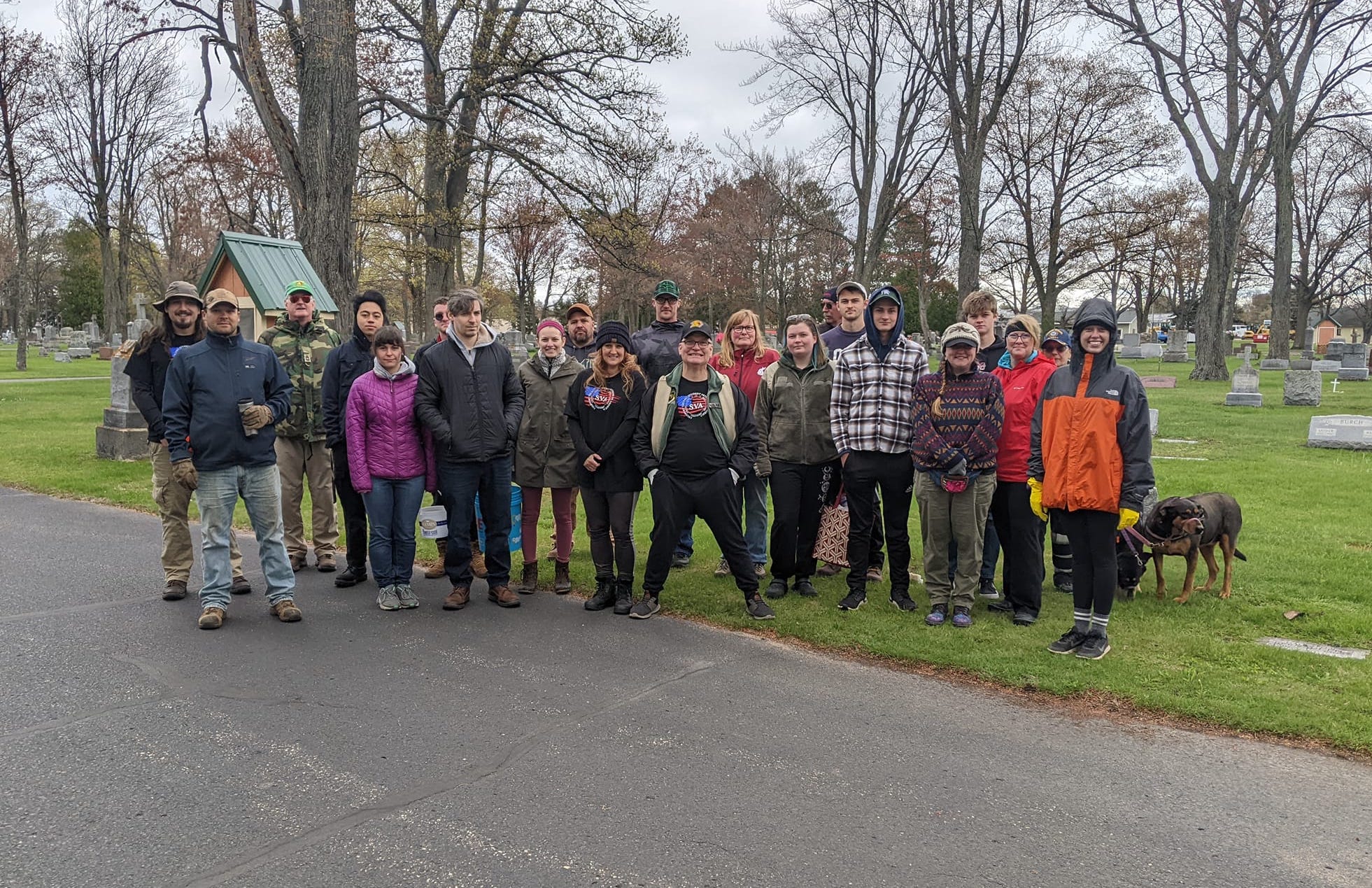 The full group of volunteers at Holy Cross Cemetery