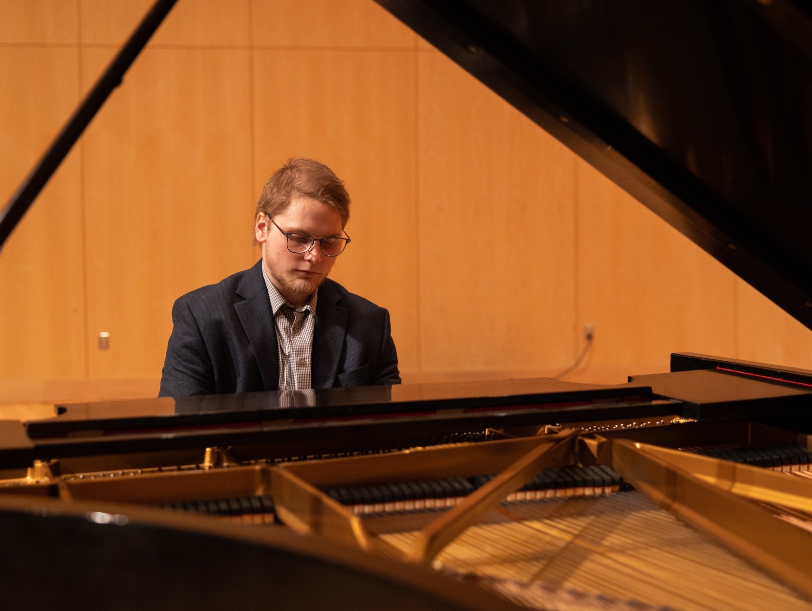 Third-place finisher Nettell on piano