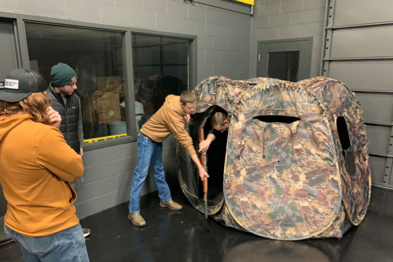 In another scenario, a conservation law enforcement student pulls a hunter out from his deer blind. (Jeremy Sergey photo)
