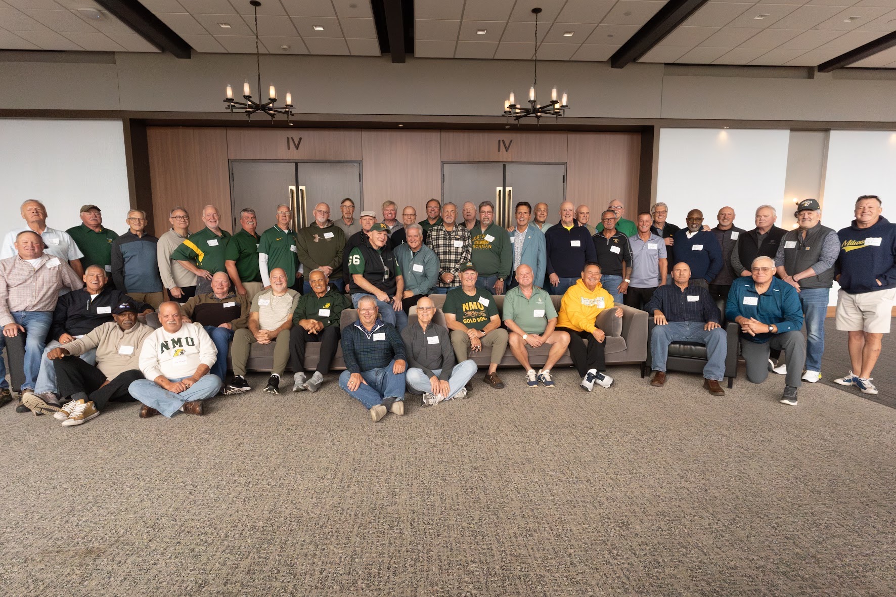 1975 team members gather in the Northern Center to kick off the reunion