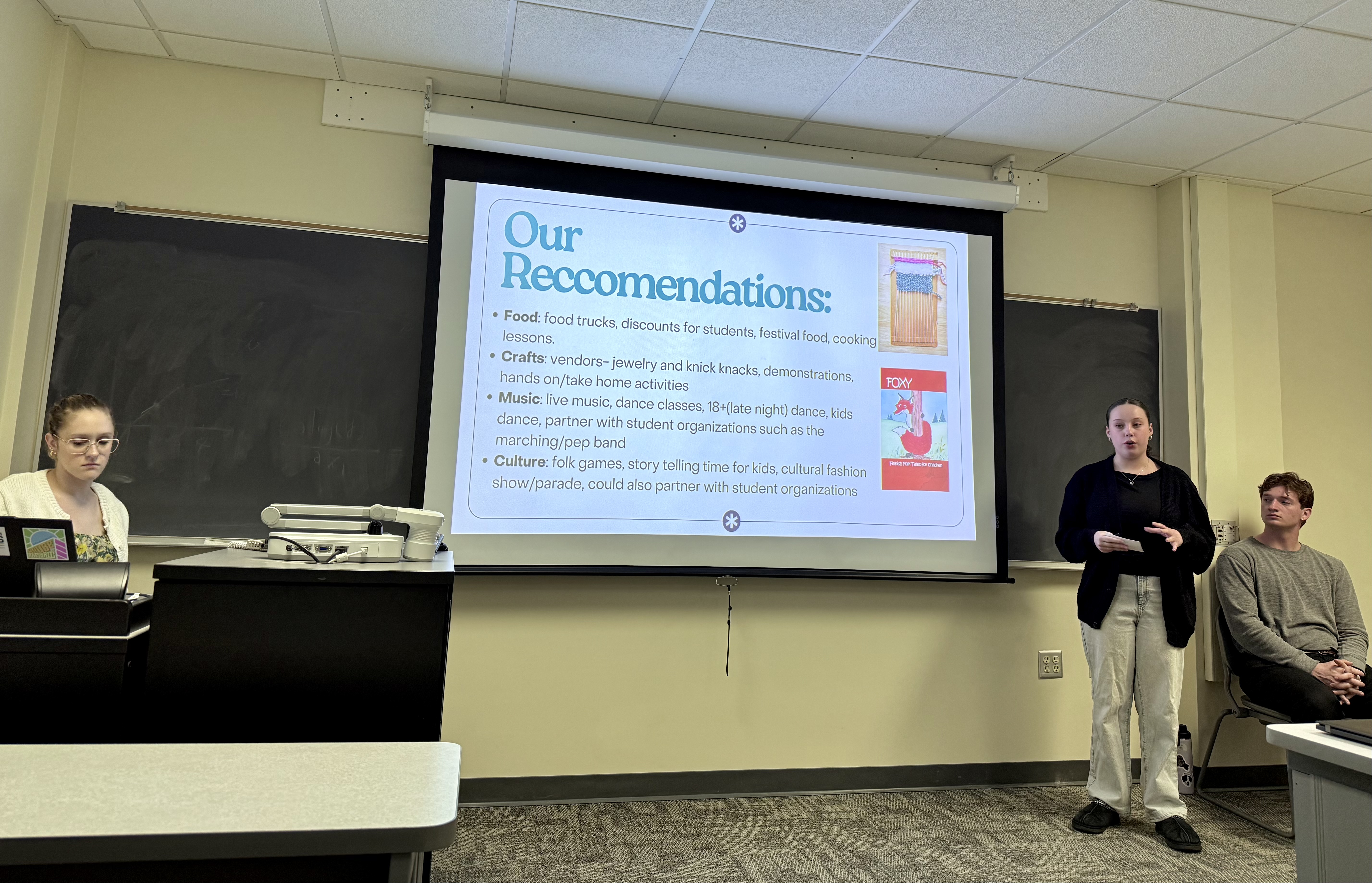 Student Emerson Byers delivers her group's recommendations on programming.