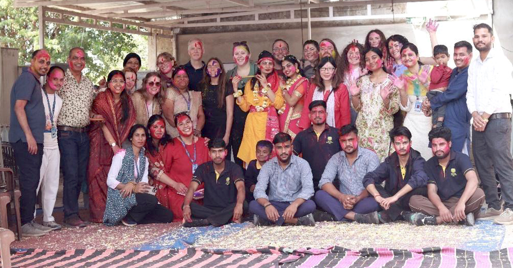 NMU students at Rajasthan Mahila Kalyan Mandal, celebrating Holi (Photo: Bhupendra Pratap Singh)