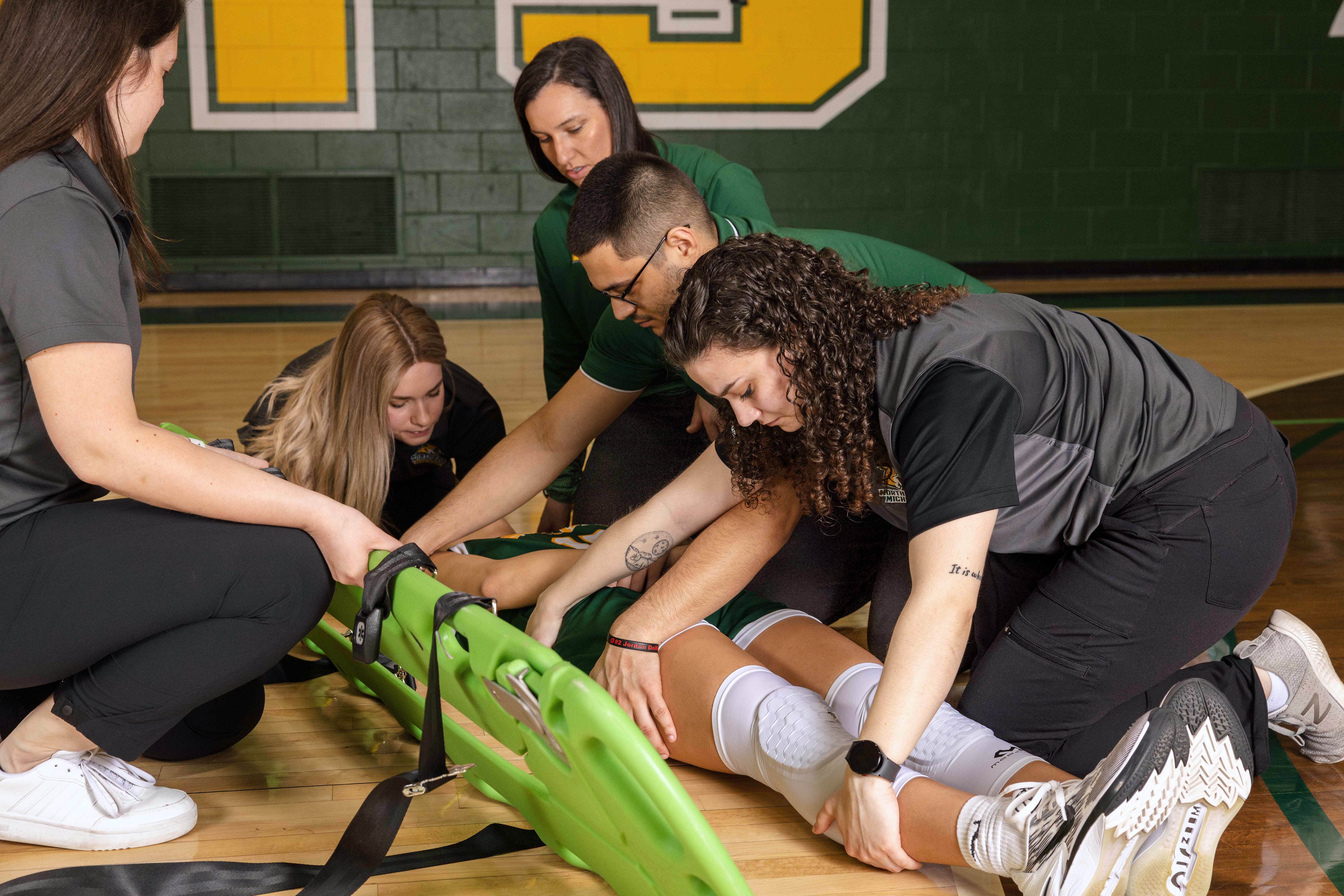NMU athletic training stock photo of students during a training exercise