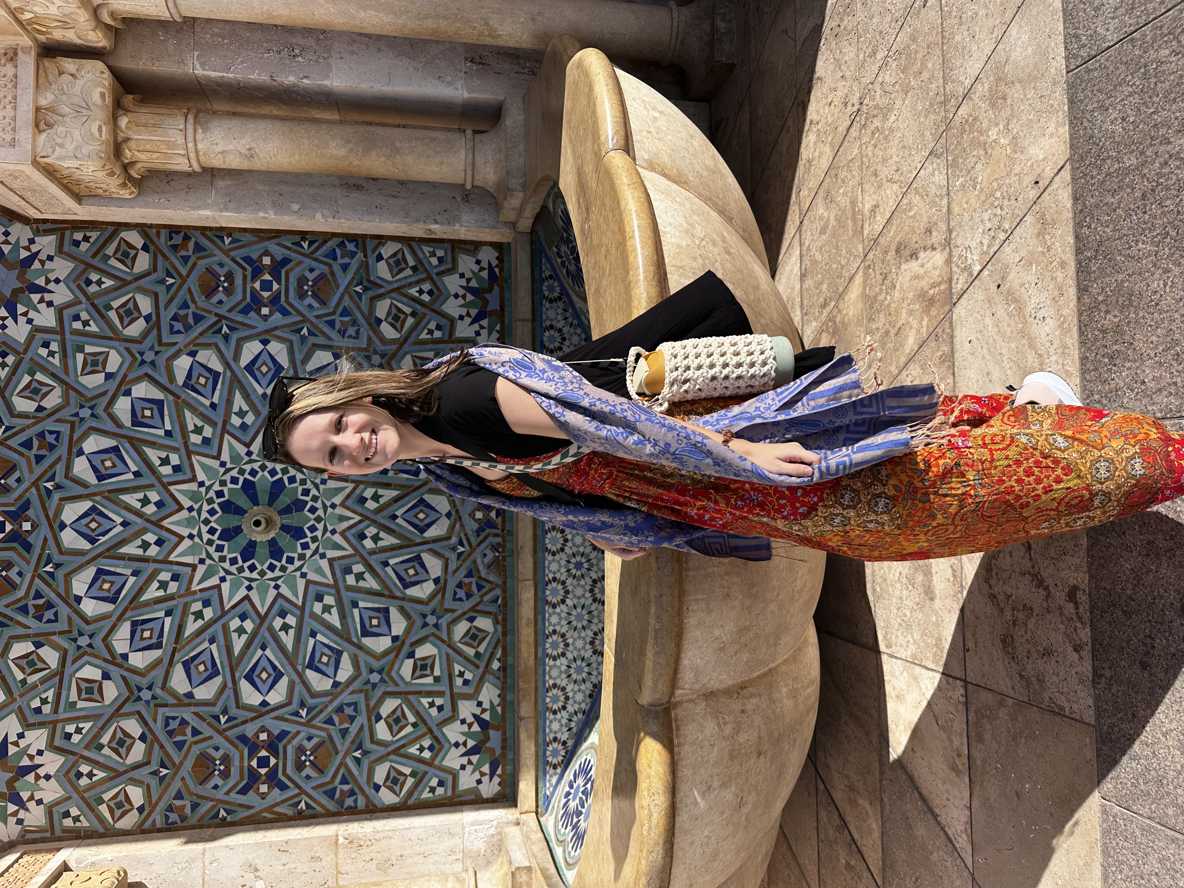 Hamel takes a photo in front of the Hassan II Mosque, in Casablanca.