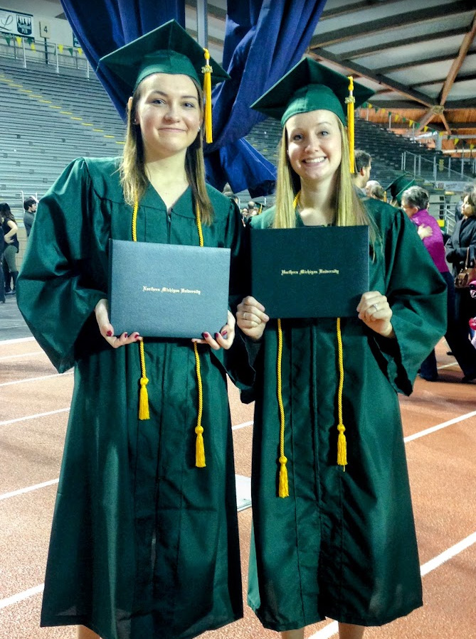 Zander and her friend, Kylee Treankler, pose for a photo on graduation day.