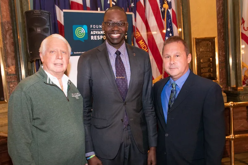 From left: NMU Trustee James Haveman, Lt. Gov. Garlin Gilchrist and NMU alumnus Brian Swift at the Impaired Driving Prevention Month Award Ceremony