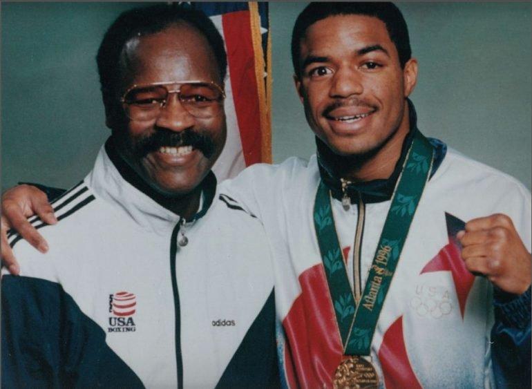 Mitchell (left) with former USOEC boxer David Reid, who won Olympic gold in 1996 and a WBA Junior Middleweight title.