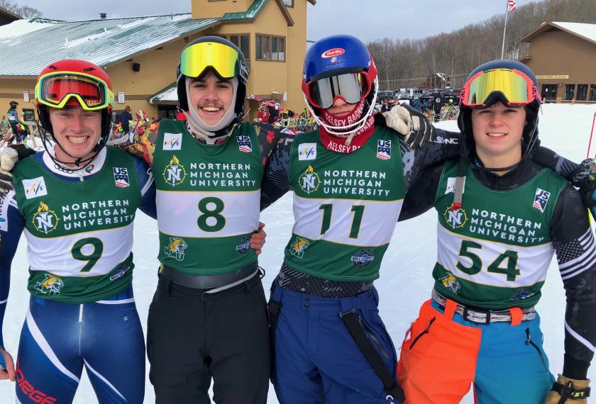 From left: NMU students Lundteigen and Seaborg; and MSHS students Aaron Grzelak, who finished second in Sunday's slalom, and Ty Springer.