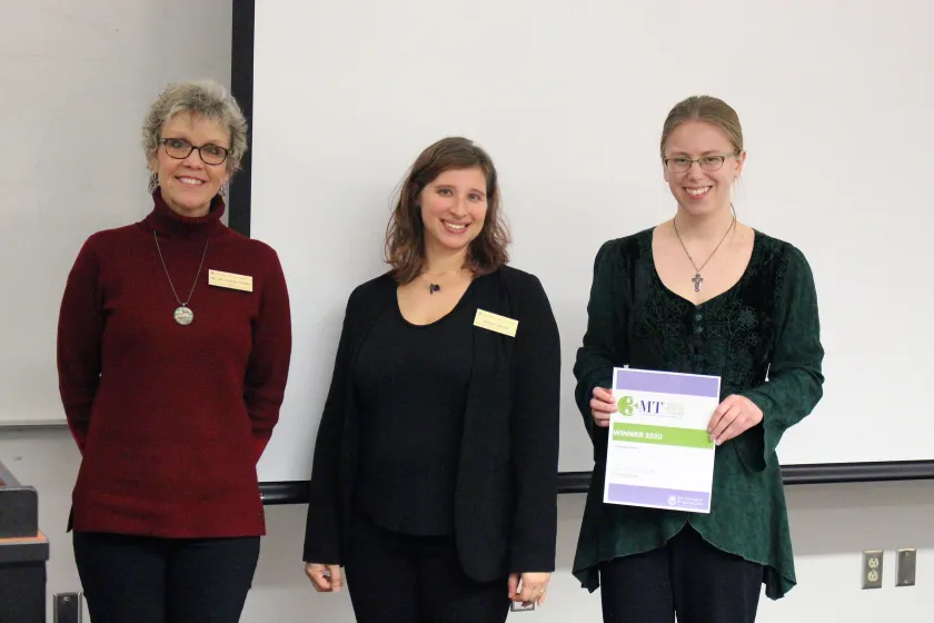From left: Lisa Eckert and Janelle Taylor of Graduate Education and Research with winner Hernstrom-Hill.