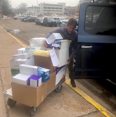 Wheeler prepares to transport the donations.