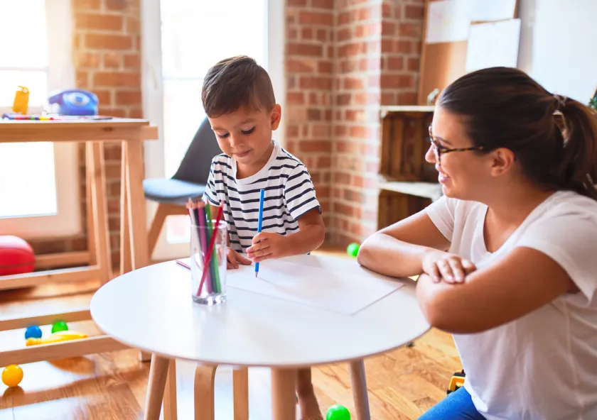 Care provider with child (iStock photo)