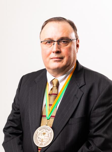 Brunswick wearing the Sam M. Cohodas Endowed Professorship medal