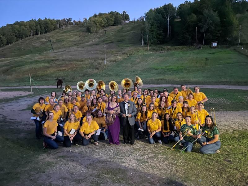Grugin (front center with his wife, Betsy) and NMU band members at the awards event.