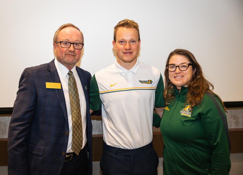 NMU Board Chair Steve Young with Zach and Head Coach Heidi Voigt