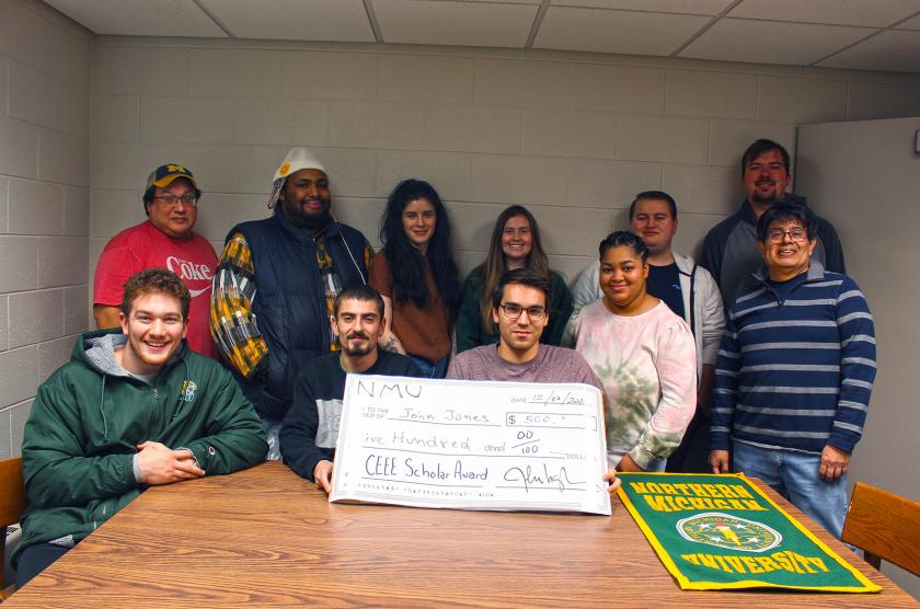 Students who received $500 CEEE Scholar Awards at the end of last semester for completing the inaugural session of the Wildcat Economics Reading Program were: (front row from left) Nathan Kwapisz, Alex Nerad, Florian Schilling, Erayna Greenwood and Professor Hugo Eyaguirre, filling in for Joshua Ingber; (back row from left) Bill Pilto, Freddie Sims, Kimberlyn Bartlett, Abby Bradfield, Donald Mowery and Dominic Natoli