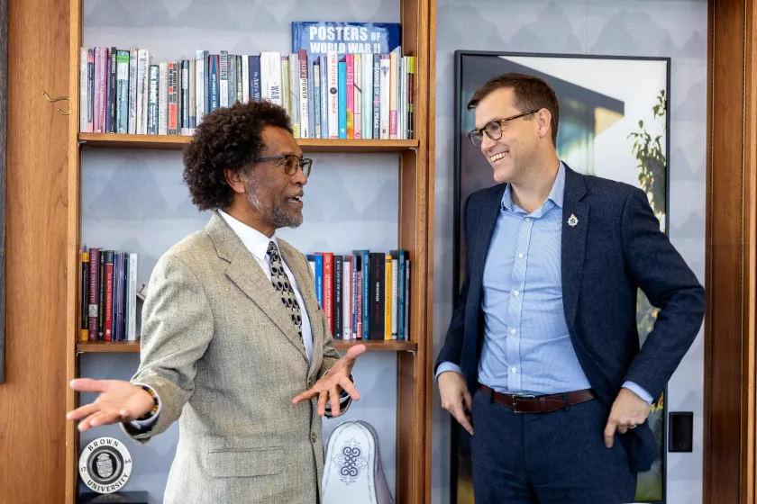 Joseph Baynesan of the Michigan Department of LEO-WD (left) meets with NMU President Brock Tessman on campus.