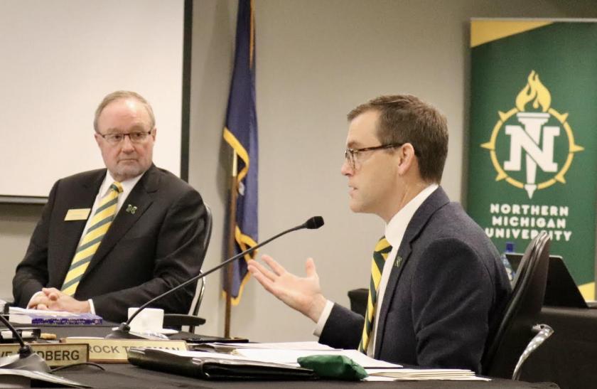 President Brock Tessman (right) and NMU Board Chair Steve Young
