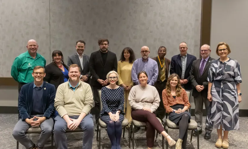 Front (from left): President Brock Tessman, Pratt, Boyer-Davis, Glendening, Johnson; Back (from left): Berry, Lenzen, Naito, Ivanovic, Nelly Kupper, Jean Kupper, Wilson, Phillips, Arts and Sciences Dean Rob Winn, and Provost Anne Dahlman