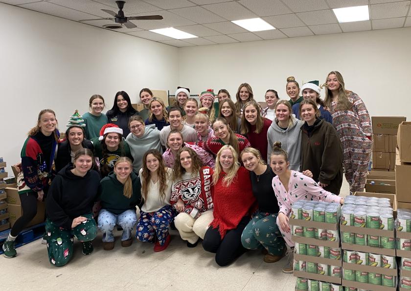 The lacrosse team volunteering at St. Vincent's food pantry