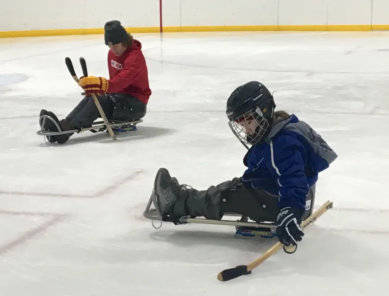 Sled hockey athletes
