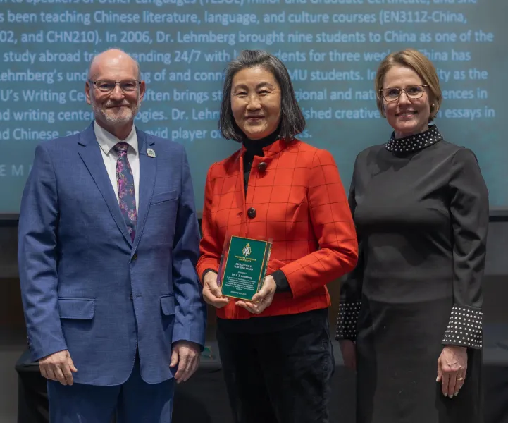 Lehmberg (center) with Rob Winn, dean of Arts and Sciences, and Provost Anne Dahlman