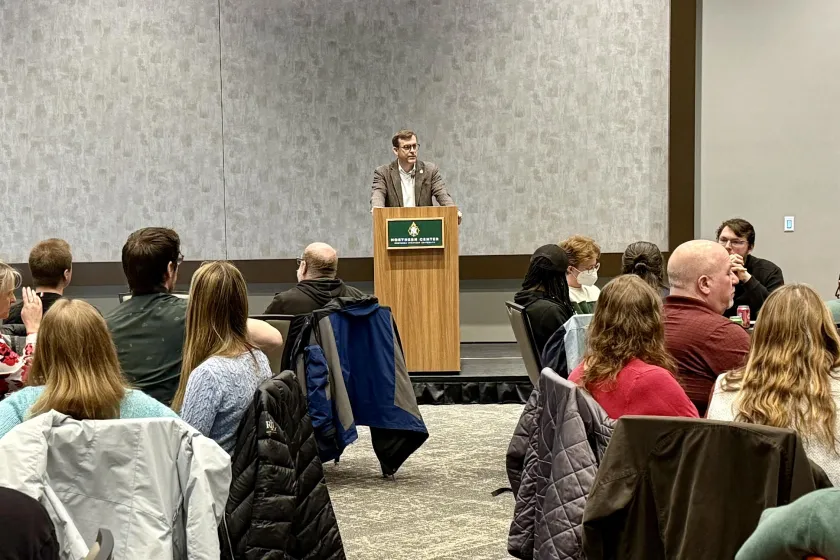 Tessman addressing the large audience of faculty, staff, students and community members in the Northern Center Ballrooms.