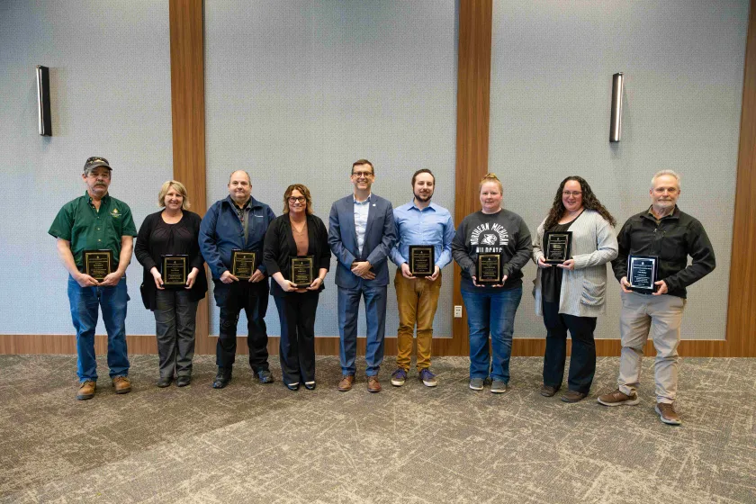 Excellence in Service Award recipients (from left): Dave Bohrer, Cara Kamps, Ken Love, Carley Leanes, Lucas Abromowitz, Andrea Hammond, Paul Ritari and Cam Hadley