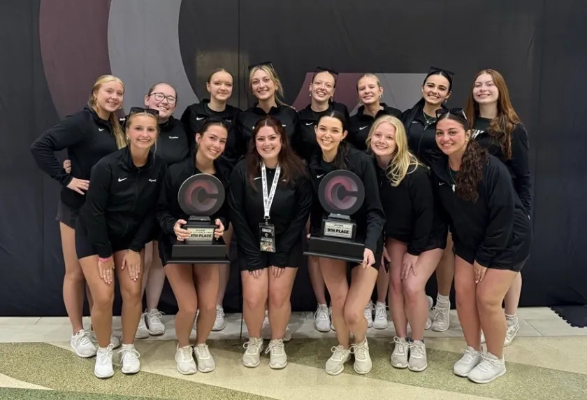 NMU Dance Team members with their trophies. Front Row: Abigail Luke, Audrey McIntosh, Allyson Smail, Erin Seiler, Keira Loranger and Jenna Filieri. Back Row: Fairyn Novak, Madeline Longson, Abigail Foskuhl, Lillian Anderson, Ava Hansen, Nina Osier, Tiffany Myres and Rilan Cope.