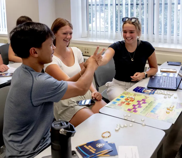 Schultz Fellows play Northern Money Games to promote financial literacy.