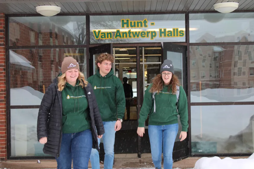 Students on campus in winter (stock photo)