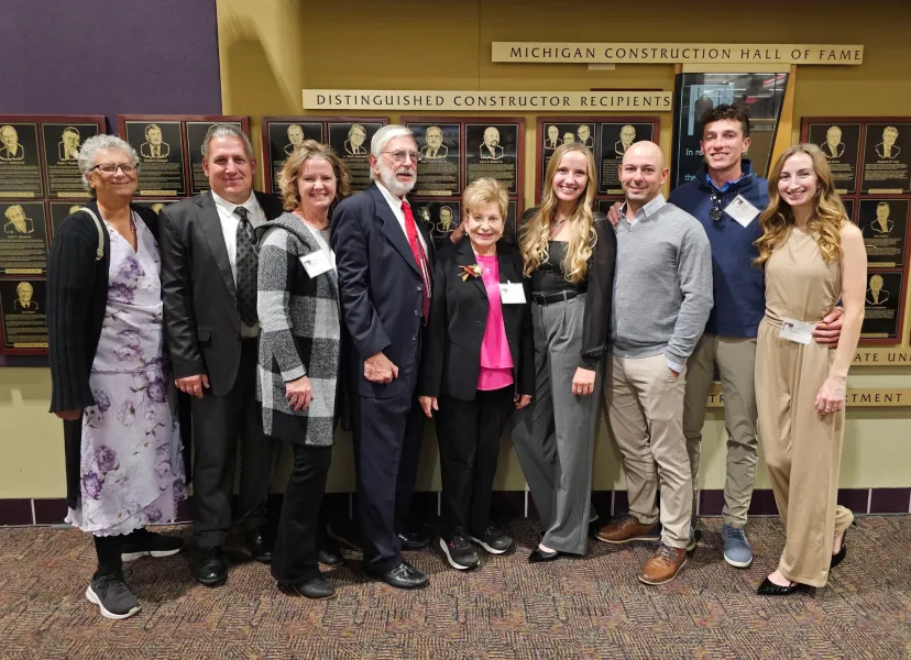 John and Mary Henry (center) surrounded by family at the induction ceremony (Photo from John Henry Excavating Inc.)