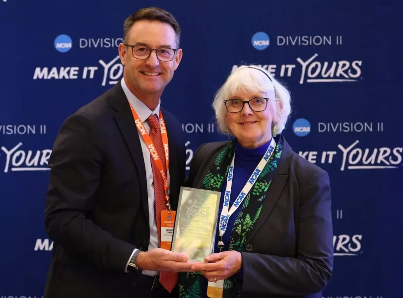 Diane Husic receiving her award