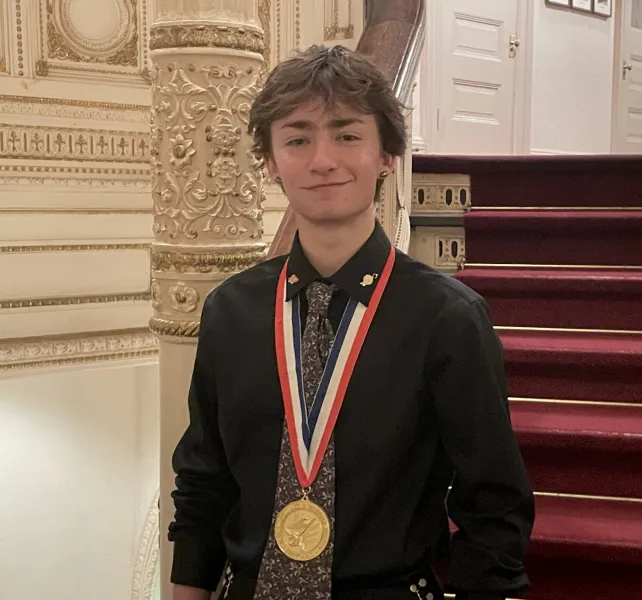 Miles Spaulding wearing his gold medal (Kel Sassi photo)