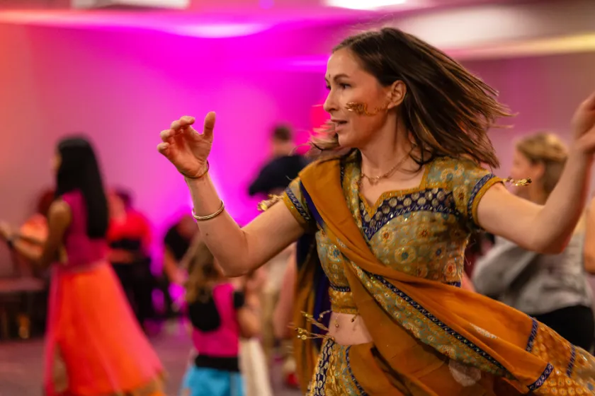 NMU alumna Jane Callander dancing during last year's Diwali celebration.