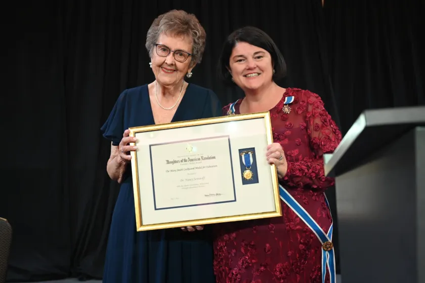 Nancy Seminoff accepts her award