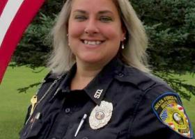 Image of Alumna Tiffany Kleiman in uniform as a security officer