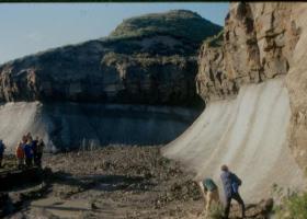 Massive ground ice in the Yamal Peninsula (northwestern Siberia), exposed when a large section of the active layer became detached and moved downhill.