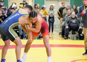 Riley Briggs (red) takes on Leandro Rodriguez
