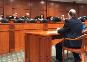 Erickson testifying before the subcommittee