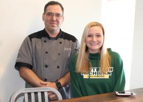 Shane Hawkins of NMU Dining and Tess Kostelec