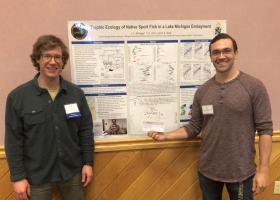 NMU biology professor Brandon Gerig (left) with Whitinger.