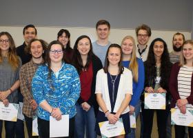 Poster award winners in attendance (from left): Carly Paget, John Whitinger, Myles Walimaa, Erin Brino, Sierra Gillman, Grace Freitag, Lane Jeakle, Isabella Oldani, Brooke Krysiak, Garrett Raubinger, Annika Desai, Chris Kailing and Tara Myers.