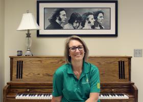 Colwitz with a Beatles poster backdrop