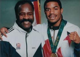 Mitchell (left) with former USOEC boxer David Reid, who won Olympic gold in 1996 and a WBA Junior Middleweight title.