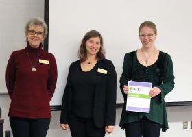 From left: Lisa Eckert and Janelle Taylor of Graduate Education and Research with winner Hernstrom-Hill.