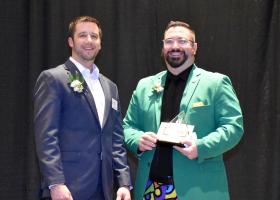 Digneit (right) with his award