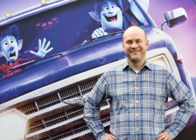 Scanlon in front of the elf brothers (Photo by Maria Laura Antonelli/Rex/Shutterstock)